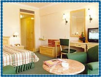 Guest Room At Hotel Ramada Plaza Palm Grove, Mumbai
